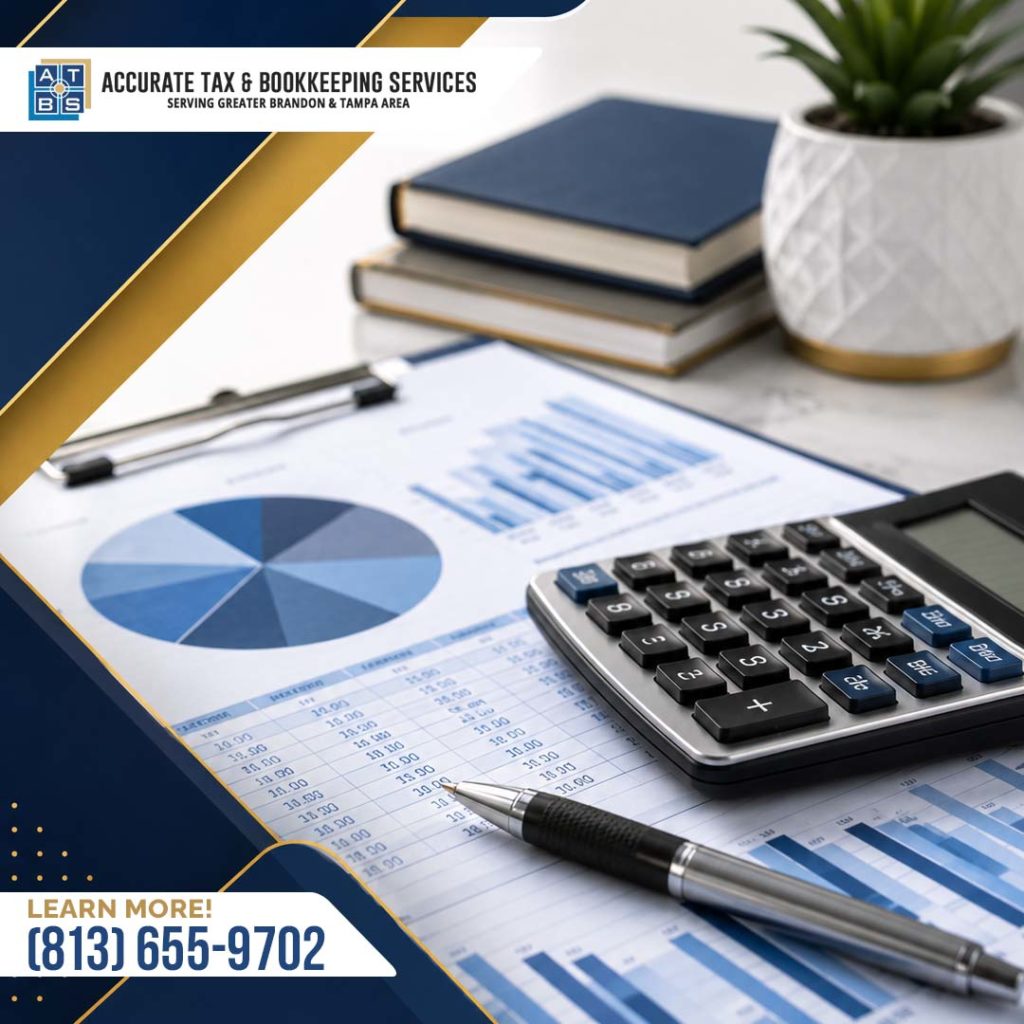 A clipboard holding financial pie charts and data tables alongside a calculator, pen, and stack of notebooks on an office desk.